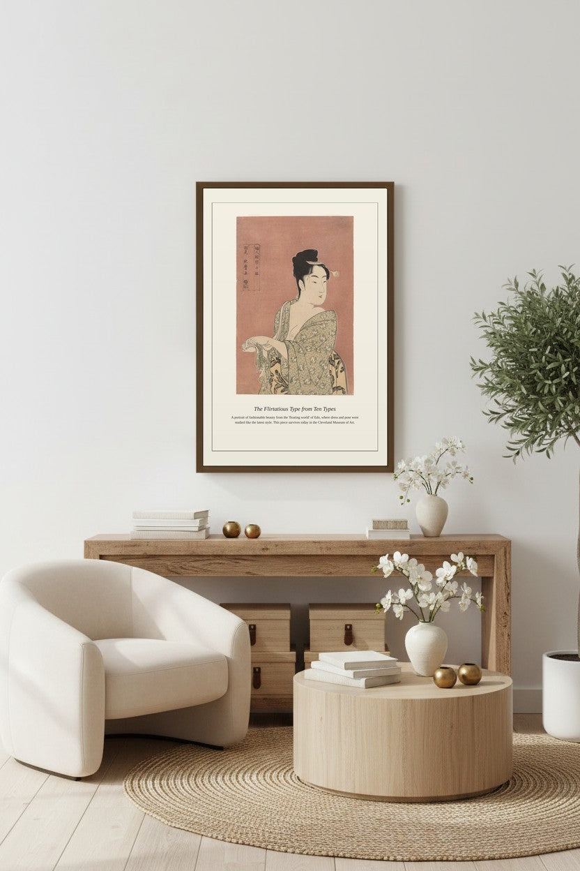 The Flirtatious Type print framed above a wooden console table beside a cream armchair