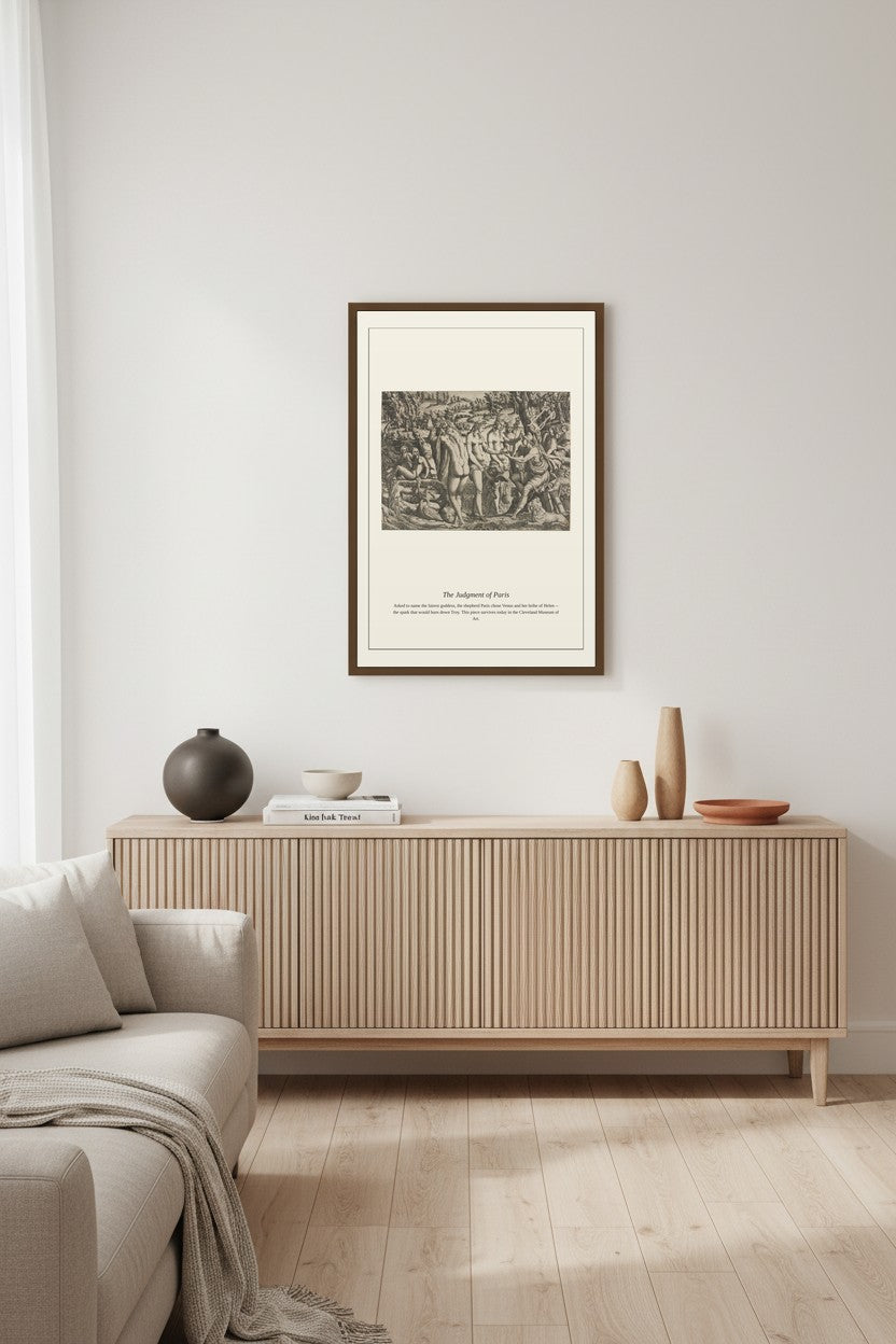 Judgment of Paris print framed above a light wood sideboard in a living room