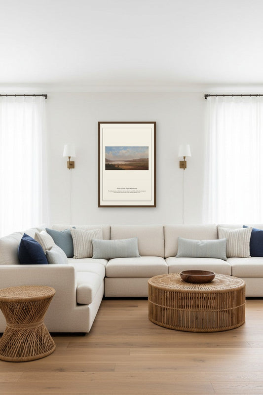 View of Lake Pepin Minnesota framed print hanging between two curtained windows above a beige sectional sofa