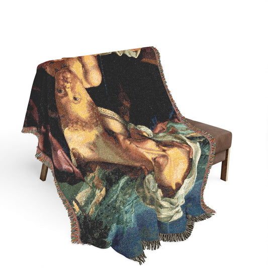 Virgin and Child in a Landscape throw blanket over bench, golden tones, dark blue background, fringe cascading over sides