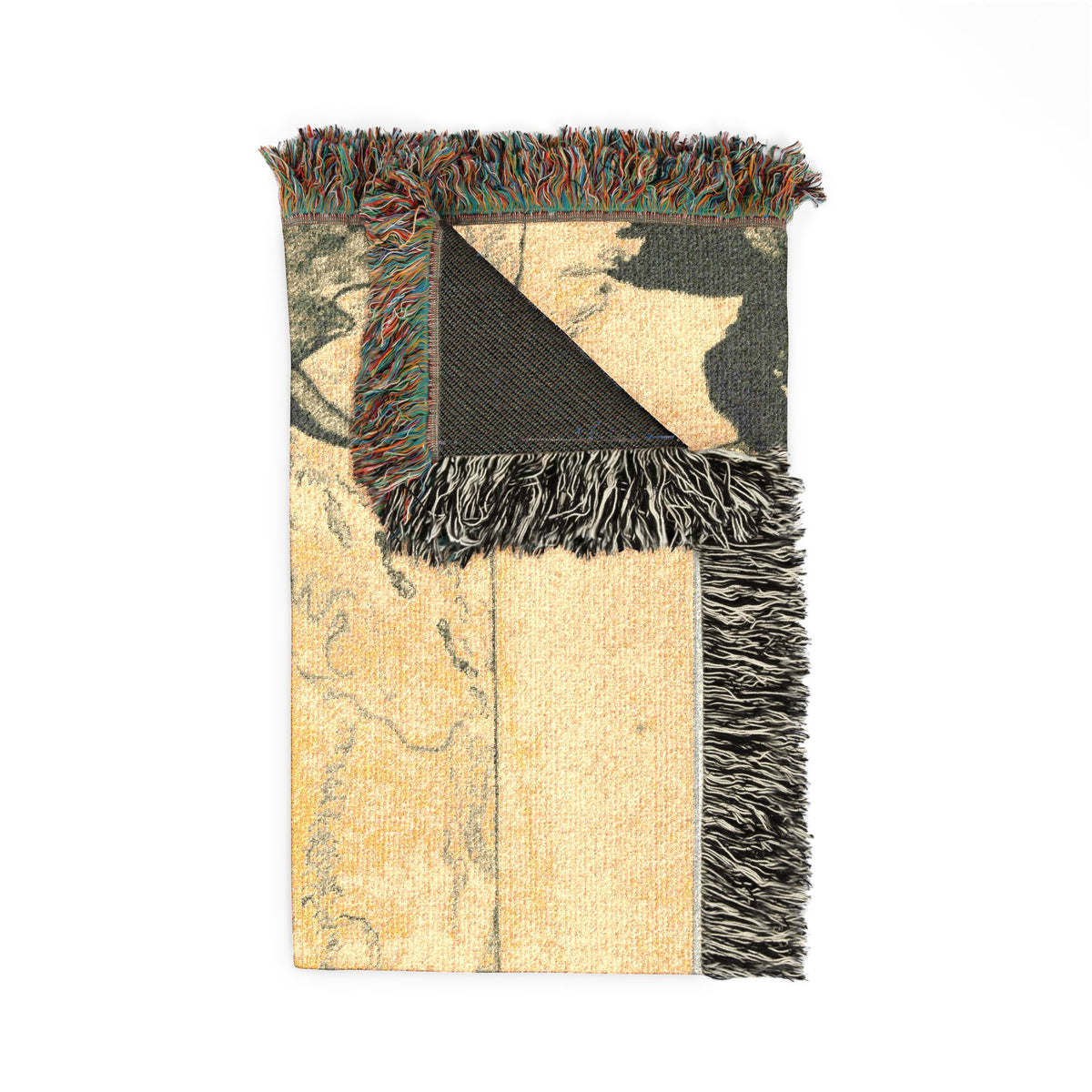 Volpini Suite woven throw blanket, golden-ochre front with charcoal reverse through triangular fold, corner detail