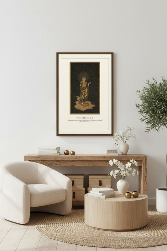 Welcoming Descent of Jiz framed above a light wood console table