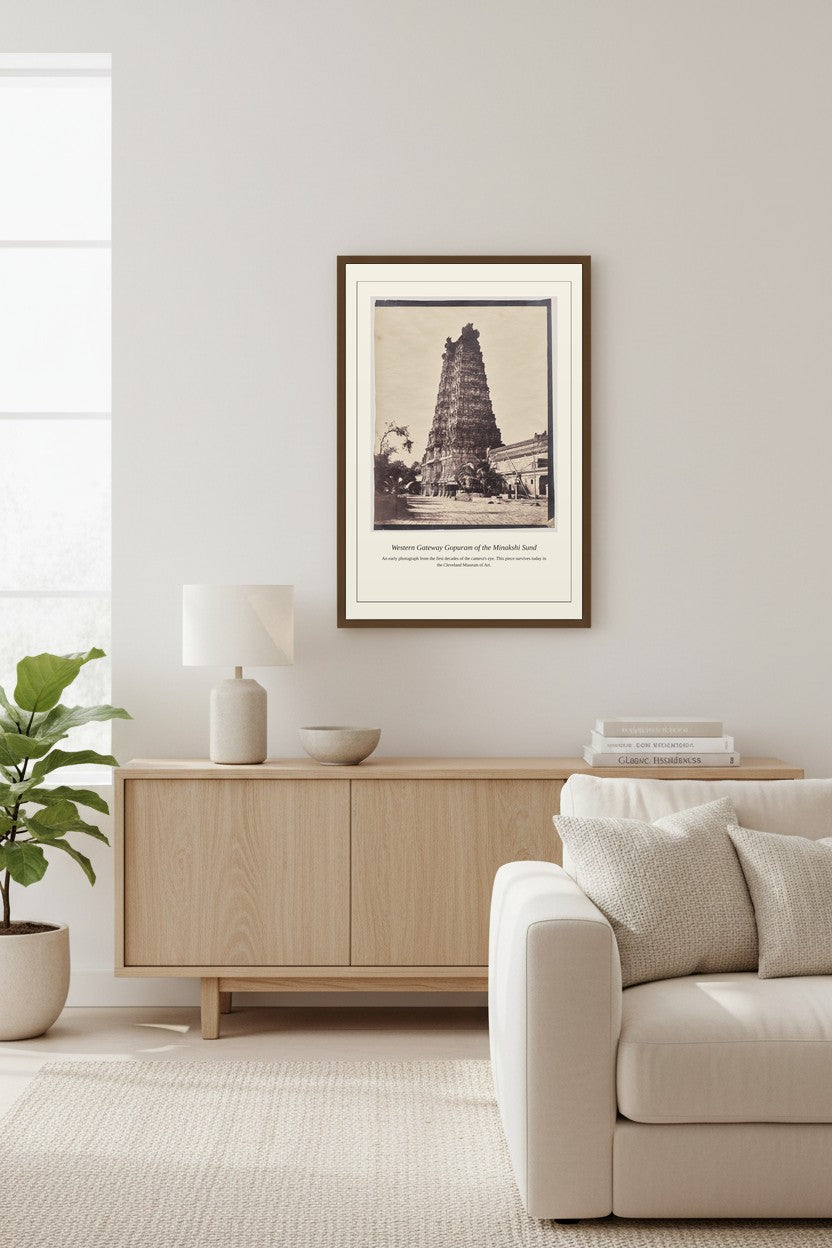 Western Gateway Gopuram of the Minakshi framed print above a wooden sideboard in a living room