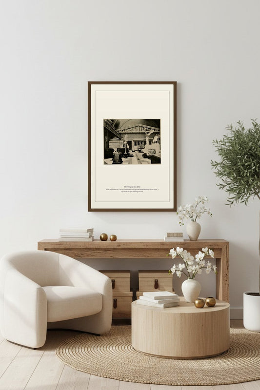 The Winged Sun Disk print framed above a light wood sideboard