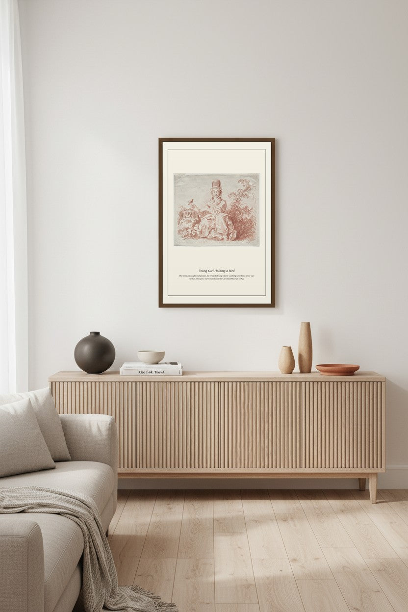 Young Girl Holding a Bird framed above a light wood sideboard with ceramic vases